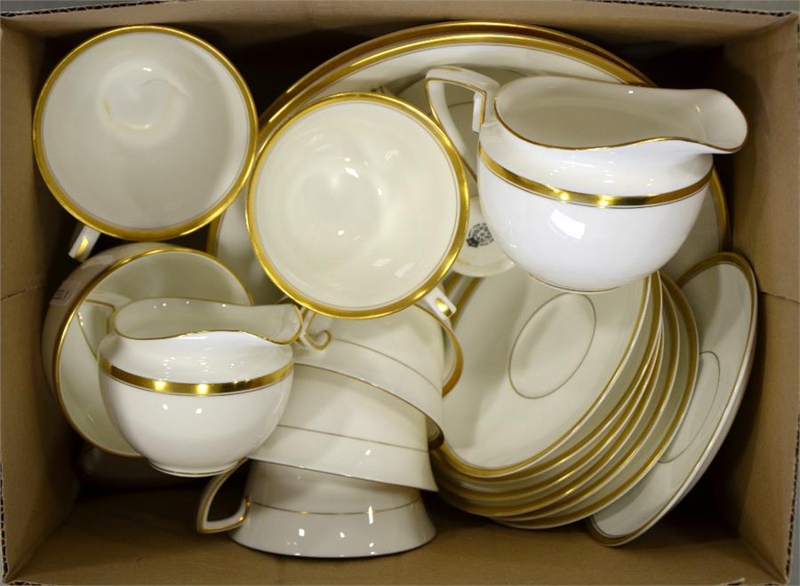 A Royal Worcester part dinner service, 'Viceroy' gold band pattern