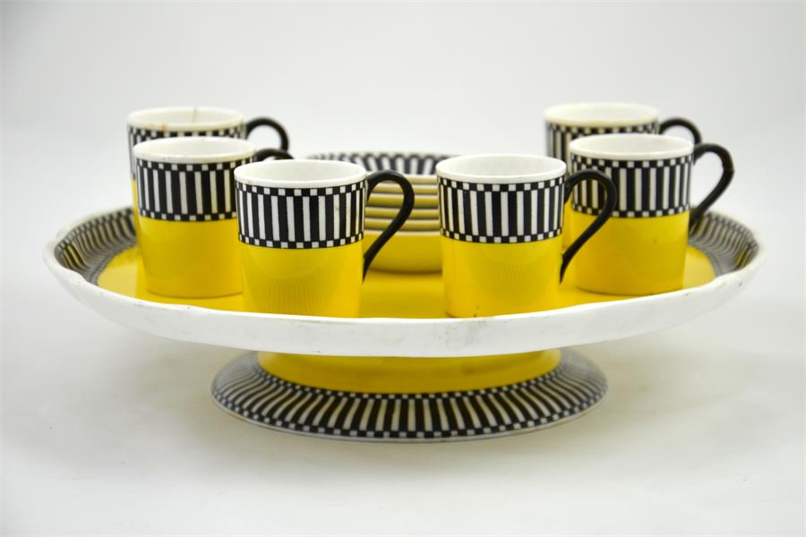 A Royal Worcester yellow and black coffee set