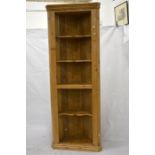 A large Victorian pine open corner cabinet