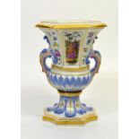 A Meissen vase of octagonal form applied with rocaille handles,