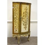 A painted and stencilled Louis XV style corner cabinet