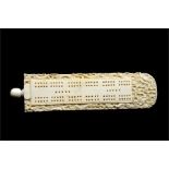 λ A Chinese carved ivory cribbage board