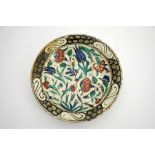 An Iznik pottery dish, Ottoman Turkey, late 16th or 17th century