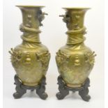 A large pair of Chinese bronze vases