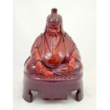 Charles Noke and Fred Allen for Royal Doulton, a Sung Mandarin or Seated Buddha