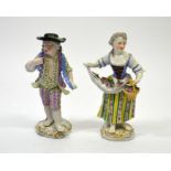 A pair of Meissen child figures