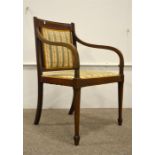 An Edwardian mahogany Sheraton style open armchair