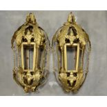 A pair of wall mounting lanterns