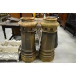 A pair of Victorian terracotta chimney pots