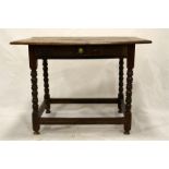 A Charles II oak single drawer side table