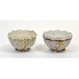 A pair of Meissen tea bowls with snowball decoration