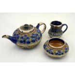 Elizabeth Sayers for Doulton Lambeth, a three piece stoneware tea set