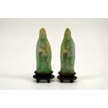 A pair of carved Chinese jade type figures