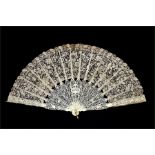 A fine 19th century Victorian ivory and lace fan