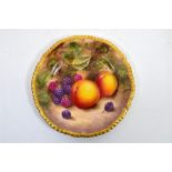 A Royal Worcester fruit decorated, rope edged, tea plate