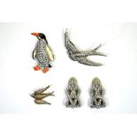 Art Deco costume jewellery including swallow brooches, enamelled penguin brooch and lapel clips (5)