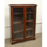 An Edwardian glazed bookcase