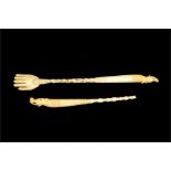 Two 19th century tribal ivory back scratchers