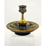Frank Butler for Doulton Lambeth, a stoneware and brass mounted candlestick
