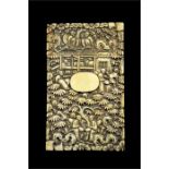 λ A Chinese carved ivory card case