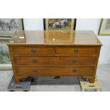 An Edwardian walnut and satinwood inlaid chest of two short over two long drawers, on bracket