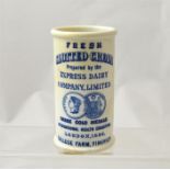 A blue transfer cylinder cream pot advertising three gold medals awarded to Express Dairy