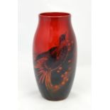 A Royal Doulton sung vase decorated with a bird in fligh