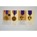 Two pairs of World War II American military medal groups