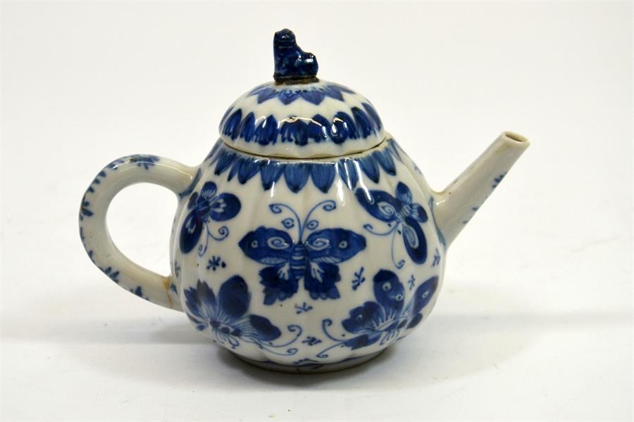 A small Chinese blue and white teapot