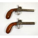 A pair of 19th century pistols