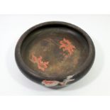 A Japanese burnished blackware bowl