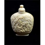 λ A Chinese carved ivory snuff bottle