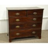 A George III mahogany chest of two short over three long drawers