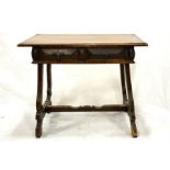 An Iberian walnut two drawer side table