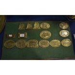 A collection of cast brass railway plaques