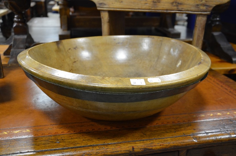 A large 19th century sycamore mixing bowl with iron band