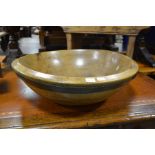 A large 19th century sycamore mixing bowl with iron band