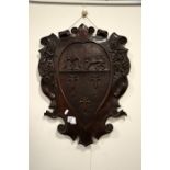 A wooden panel crest for Eton School