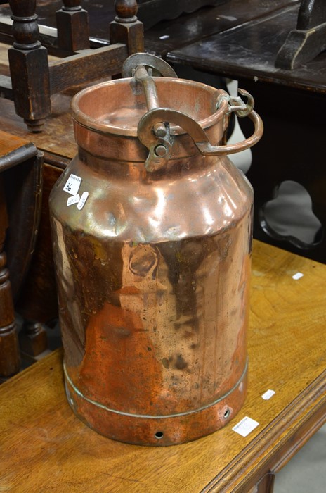 A large copper milk container