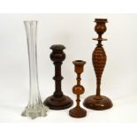 A collection of wooden candlesticks and a glass spill vase, tallest 41cm. (4)