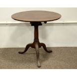 A George II mahogany birdcage mechanism tilt top occasional table