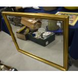 A gilt framed bevelled edge mirror