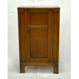 A 1920s oak cupboard