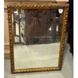 A wooden framed mirror