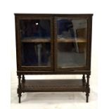 A Victorian carved and stained pine display cabinet