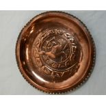 An Arts and Crafts copper plaque