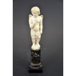 A 19th century Dieppe carved ivory figure of Cupid