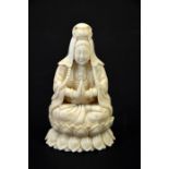 λ A Chinese carved ivory figure of Guanyin, circa 1900