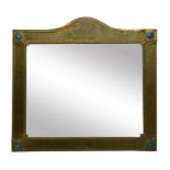 An Arts and Crafts brass and enamelled mirror