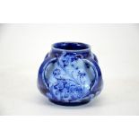 William Moorcroft for James Macintyre, a Florian blue on blue floral vase, four handled form